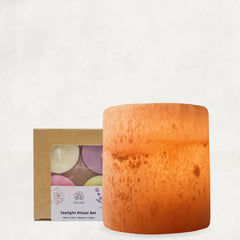 Rauhia Siwa salt candle holder with warm amber tealight and Rauhia scented tealight set with Oasis Blossom Moon and Calm candles