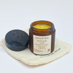 Rauhia Sacred Glow massage candle with rose and frankincense